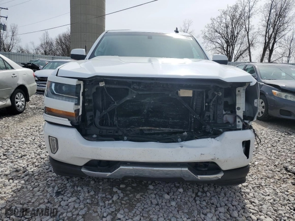 2018 Chevrolet Silverado 1500 LT with VIN 3GCUKREC7JG514282, listed as a Copart auction lot 51233285 with 201,593 mi miles and Clean Title. Bid and sale history available at carsss.com. Image 5.
