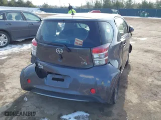 2013 Scion iQ with VIN JTNJJXB00DJ025113, listed as a IAAI auction lot 41503756 with 105,557 mi miles. Bid and sale history available at carsss.com. Image 4.