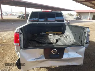 2011 Nissan Titan SV with VIN 1N6BA0ED6BN324977, listed as a IAAI auction lot 41275371 with 290,967 mi miles and . Bid and sale history available at DreamBid. Image 16.