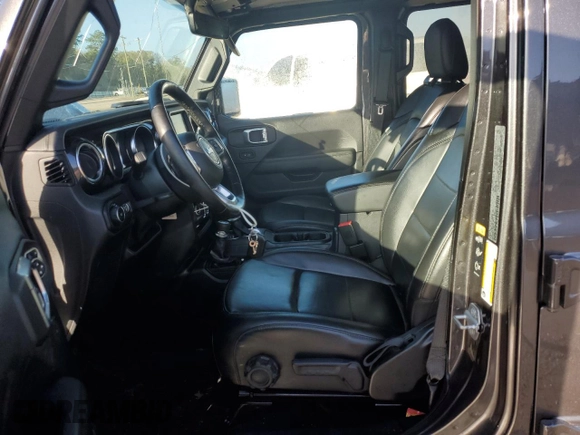 2020 Jeep Wrangler Unlimited Sahara Altitude z VIN 1C4HJXEG7LW312770, wystawiony jako Copart lot #81186294 z przebiegiem 56 926 mil mil oraz Szkoda całkowita • Salvage title. Historia ofert i sprzedaży dostępna na DreamBid. Obrazek 7.