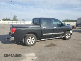 2010 Nissan Titan LE with VIN 1N6BA0EC6AN320790, listed as a Copart auction lot 52613495 with 224,118 mi miles and Salvage Title. Bid and sale history available at carsss.com. Image 3.