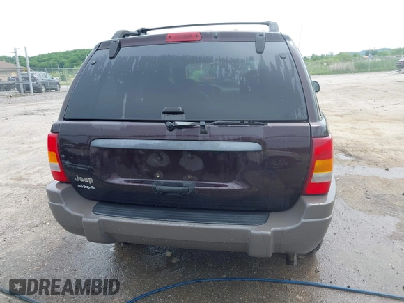 2004 Jeep Grand Cherokee Laredo z VIN 1J4GW48S94C209326, wystawiony jako IAAI lot #42309565 z przebiegiem 159 429 mil mil oraz . Historia ofert i sprzedaży dostępna na DreamBid. Obrazek 16.