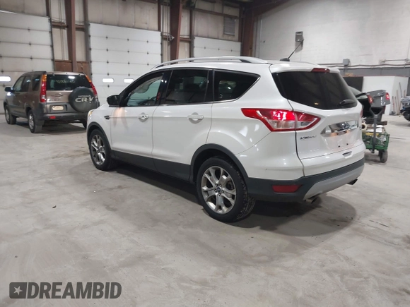 2016 Ford Escape Titanium with VIN 1FMCU9J95GUB02377, listed as a IAAI auction lot 41869557 with 88,441 mi miles. Bid and sale history available at carsss.com. Image 3.