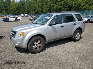 2011 Ford Escape XLS with VIN 1FMCU0C75BKA71501, listed as a Copart auction lot 62614335 with 130,210 mi miles and Salvage title. Bid and sale history available at DreamBid. Image 1.