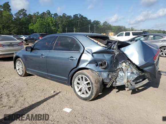 2012 Ford Fusion SEL z VIN 3FAHP0JA9CR333944, wystawiony jako Copart lot #56907605 z przebiegiem 180 386 mil mil oraz Szkoda całkowita • Salvage title. Historia ofert i sprzedaży dostępna na DreamBid. Obrazek 2.