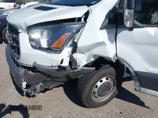 2018 Ford Transit with VIN 1FTYR1YG0JKA80745, listed as a IAAI auction lot 41351116 with 167,186 mi miles and . Bid and sale history available at DreamBid. Image 6.