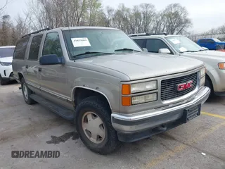 1998 GMC Suburban z VIN 3GKFK16R1WG510379, wystawiony jako IAAI lot #41859604 z przebiegiem 300 493 mil mil oraz . Historia ofert i sprzedaży dostępna na DreamBid. Obrazek 1.