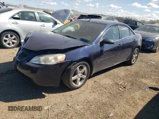 2009 Pontiac G6 w/1SA *Ltd Avail* with VIN 1G2ZG57N294125190, listed as a Copart auction lot 69591384 with 215,658 mi miles and Salvage Title. Bid and sale history available at carsss.com. Image 1.