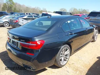 2019 BMW 7 Series 740i xDrive with VIN WBA7E4C57KGV70521, listed as a IAAI auction lot 41881538 with 114,480 mi miles and . Bid and sale history available at DreamBid. Image 4.