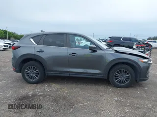 2021 Mazda CX-5 Touring with VIN JM3KFACM1M0461510, listed as a IAAI auction lot 41660439 with 30,352 mi miles. Bid and sale history available at carsss.com. Image 13.