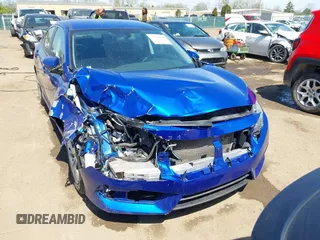 2018 Honda Civic LX with VIN 19XFC2F53JE020297, listed as a IAAI auction lot 42114807 with 124,058 mi miles and . Bid and sale history available at carsss.com. Image 6.