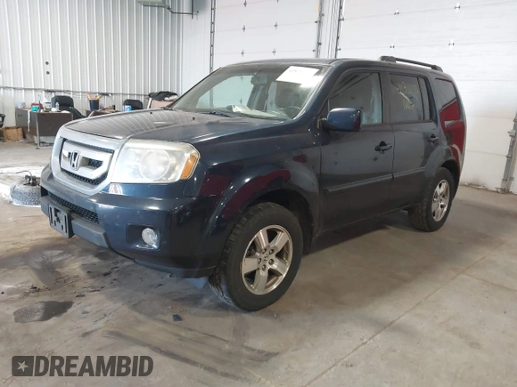 2011 Honda Pilot EX-L with VIN 5FNYF4H54BB043205, listed as a IAAI auction lot 41879077 with 240,108 mi miles. Bid and sale history available at carsss.com. Image 17.