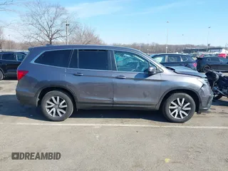 2021 Honda Pilot EX-L with VIN 5FNYF6H54MB028203, listed as a IAAI auction lot 41641116 with 46,755 mi miles and . Bid and sale history available at DreamBid. Image 13.