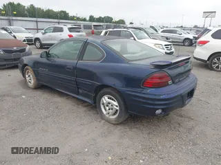2001 Pontiac Grand Am with VIN 1G2NE12T11M633383, listed as a IAAI auction lot 42505148 with 107,037 mi miles and . Bid and sale history available at DreamBid. Image 3.