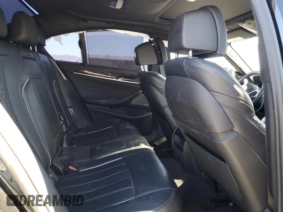 2023 BMW 5 Series M550i xDrive с VIN WBA13BK04PCM97306, выставлен на аукционе Copart как лот 76813754 с пробегом 19 259 миль миль и Списание • Salvage title. История ставок и продаж доступна на DreamBid. Изображение 10.