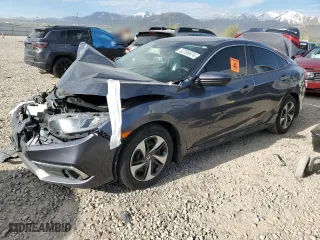 2020 Honda Civic Sedan LX with VIN 2HGFC2F66LH576895, listed as a Copart auction lot 52206974 with NaN miles and Salvage Title. Bid and sale history available at carsss.com. Image 1.