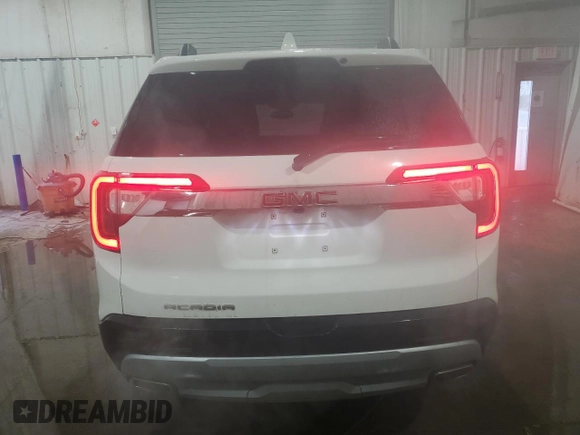 2023 GMC Acadia SLT with VIN 1GKKNML4XPZ188990, listed as a Copart auction lot 46782705 with 61,340 mi miles and Clean Title. Bid and sale history available at DreamBid. Image 6.