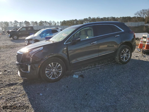 2021 Cadillac XT5 AWD Premium Luxury with VIN 1GYKNDRS0MZ189184, listed as a Copart auction lot 88459405 with 26,883 mi miles and Salvage Title. Bid and sale history available at carsss.com. Image 1.