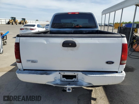 2003 Ford F-150 XL z VIN 2FTRX17253CA75533, wystawiony jako Copart lot #57361145 z przebiegiem 220 482 mil mil oraz Szkoda całkowita • Salvage title. Historia ofert i sprzedaży dostępna na DreamBid. Obrazek 6.