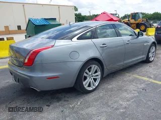 2013 Jaguar XJ with VIN SAJWJ1CD4D8V46305, listed as a IAAI auction lot 42637329 with 101,532 mi miles and . Bid and sale history available at DreamBid. Image 4.