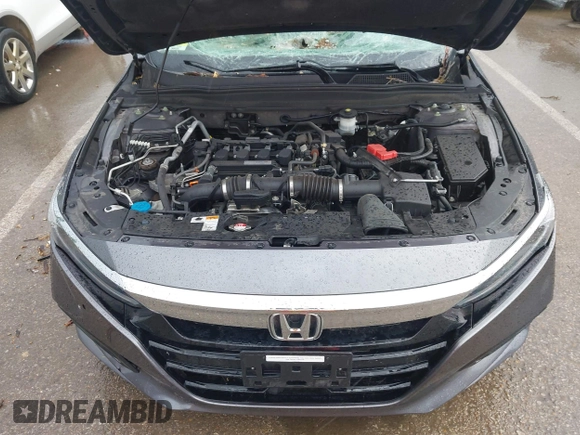 2018 Honda Accord Touring with VIN 1HGCV1F92JA005210, listed as a IAAI auction lot 42378040 with 69,294 mi miles and . Bid and sale history available at DreamBid. Image 10.