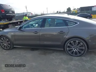 2012 Audi A7 Prestige с VIN WAU2GAFC7CN122113, выставлен на аукционе IAAI как лот 42111441 с пробегом 149 617 миль миль и . История ставок и продаж доступна на DreamBid. Изображение 14.
