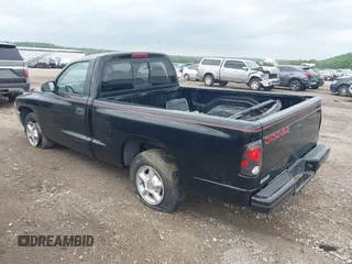 1998 Dodge Dakota SLT with VIN 1B7FL26X0WS720008, listed as a IAAI auction lot 42120683 with 194,922 mi miles and . Bid and sale history available at carsss.com. Image 3.