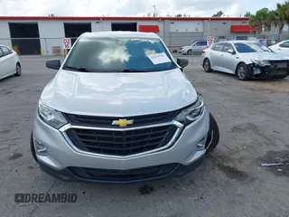 2020 Chevrolet Equinox LS z VIN 3GNAXHEV8LS696940, wystawiony jako IAAI lot #42153761 z przebiegiem 60 309 mil mil oraz . Historia ofert i sprzedaży dostępna na DreamBid. Obrazek 12.