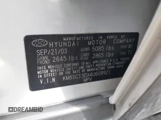 2004 Hyundai Santa Fe GLS with VIN KM8SC13DX4U609921, listed as a IAAI auction lot 41619492 with 113,592 mi miles. Bid and sale history available at carsss.com. Image 9.
