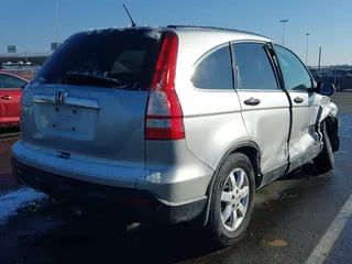 2009 Honda CR-V EX with VIN 3CZRE38589G704086, listed as a IAAI auction lot 41348951 with 128,784 mi miles and . Bid and sale history available at carsss.com. Image 4.