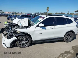 2016 BMW X1 xDrive28i z VIN WBXHT3C32G5E51855, wystawiony jako IAAI lot #41634237 z przebiegiem 69 101 mil mil oraz . Historia ofert i sprzedaży dostępna na DreamBid. Obrazek 13.