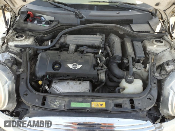 2010 MINI Hardtop with VIN WMWMF3C52ATZ65593, listed as a Copart auction lot 50107445 with 105,389 mi miles and Salvage title. Bid and sale history available at DreamBid. Image 11.