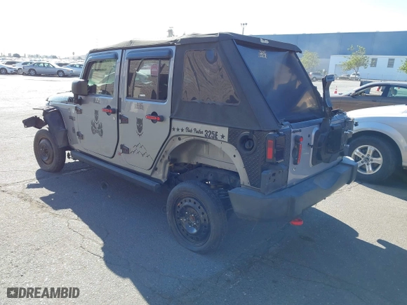 2015 Jeep Wrangler Unlimited Sport with VIN 1C4BJWDG7FL587014, listed as a IAAI auction lot 40641034 with 81,045 mi miles. Bid and sale history available at carsss.com. Image 3.