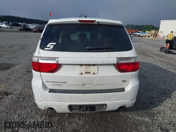 2013 Dodge Durango R/T with VIN 1C4SDHCT4DC648639, listed as a IAAI auction lot 42504044 with 193,909 mi miles and . Bid and sale history available at DreamBid. Image 16.