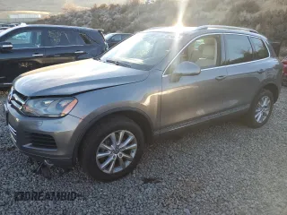 2013 Volkswagen Touareg Lux with VIN WVGEF9BPXDD002285, listed as a Copart auction lot 82248604 with 150,780 mi miles and Salvage Title. Bid and sale history available at DreamBid. Image 1.