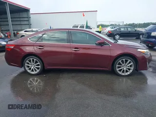 2014 Toyota Avalon Limited with VIN 4T1BK1EB3EU113035, listed as a IAAI auction lot 42040239 with 118,609 mi miles. Bid and sale history available at carsss.com. Image 12.