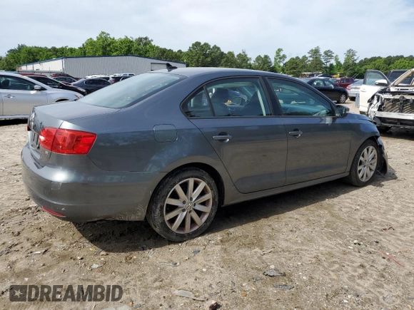 2014 Volkswagen Jetta SE with VIN 3VWD17AJ0EM246952, listed as a Copart auction lot 57507645 with 127,764 mi miles and Clean title. Bid and sale history available at DreamBid. Image 3.