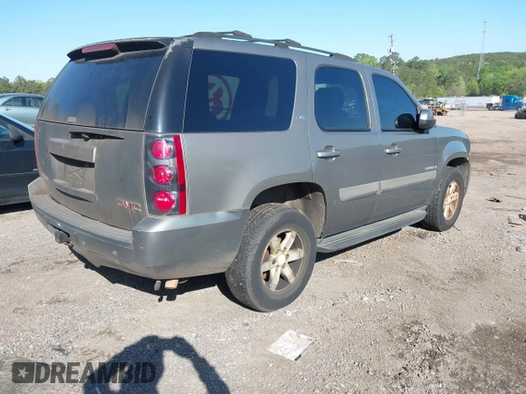2007 GMC Yukon SLT with VIN 1GKFC13J57J103418, listed as a IAAI auction lot 41955682 with 318,338 mi miles. Bid and sale history available at carsss.com. Image 4.