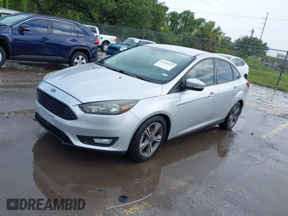 2016 Ford Focus SE с VIN 1FADP3FE7GL406809, выставлен на аукционе IAAI как лот 42570319 с пробегом 114 550 миль миль и . История ставок и продаж доступна на DreamBid. Изображение 2.