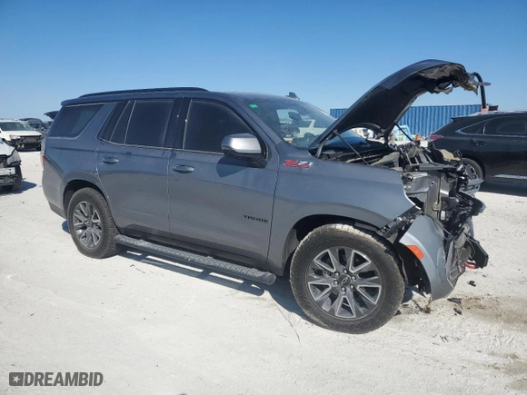 2022 Chevrolet Tahoe Z71 with VIN 1GNSKPKL5NR141563, listed as a Copart auction lot 45292915 with 30,715 mi miles and Salvage Title. Bid and sale history available at carsss.com. Image 4.