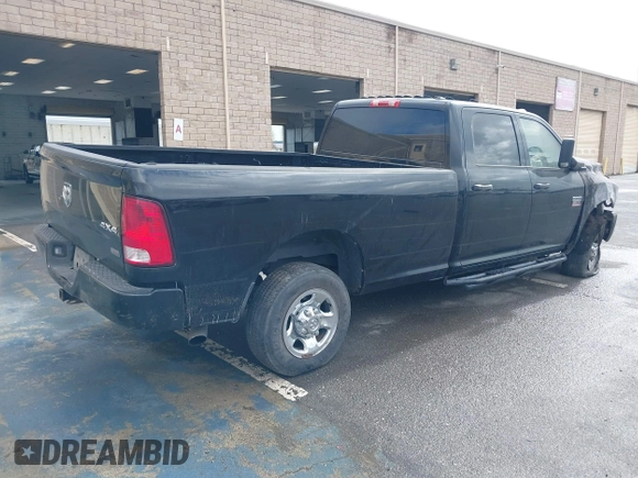 2012 Ram 2500 ST z VIN 3C6UD5HL0CG181853, wystawiony jako IAAI lot #41603748 z przebiegiem Nie podano mil oraz . Historia ofert i sprzedaży dostępna na DreamBid. Obrazek 4.