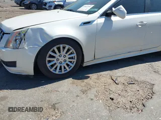 2012 Cadillac CTS z VIN 1G6DA5E51C0151324, wystawiony jako IAAI lot #41811207 z przebiegiem 100 407 mil mil oraz . Historia ofert i sprzedaży dostępna na DreamBid. Obrazek 13.