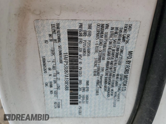 2007 Ford Taurus SE with VIN 1FAFP53U87A138588, listed as a Copart auction lot 56965245 with Not provided miles and Salvage title. Bid and sale history available at DreamBid. Image 12.