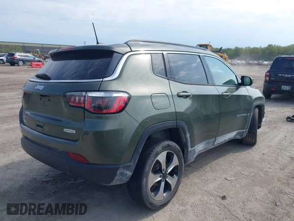 2018 Jeep Compass Latitude with VIN 3C4NJDBB4JT176031, listed as a IAAI auction lot 42125161 with 32,761 mi miles and . Bid and sale history available at DreamBid. Image 4.