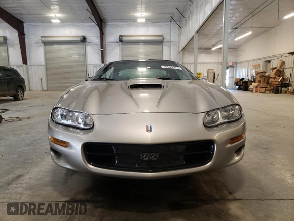2001 Chevrolet Camaro Z28 z VIN 2G1FP22GX12112874, wystawiony jako Copart lot #70669594 z przebiegiem 58 773 mil mil oraz Szkoda całkowita • Salvage title. Historia ofert i sprzedaży dostępna na DreamBid. Obrazek 5.
