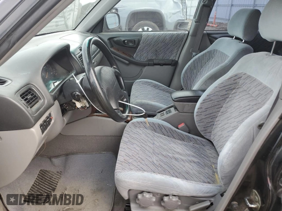 1999 Subaru Forester S with VIN JF1SF6550XH735142, listed as a Copart auction lot 85818264 with 0 mi miles and Salvage Title. Bid and sale history available at carsss.com. Image 7.