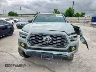 2023 Toyota Tacoma SR with VIN 3TMCZ5AN2PM580515, listed as a Copart auction lot 60422635 with 65,846 mi miles and Salvage title. Bid and sale history available at DreamBid. Image 5.