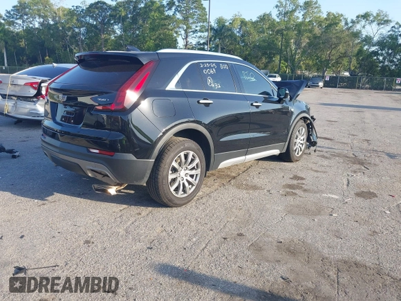 2021 Cadillac XT4 FWD Premium Luxury with VIN 1GYFZCR47MF000064, listed as a IAAI auction lot 41974115 with 1 mi miles. Bid and sale history available at carsss.com. Image 4.