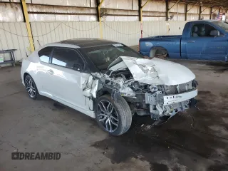 2015 Scion tC z VIN JTKJF5C70FJ003274, wystawiony jako Copart lot #53675415 z przebiegiem 83 326 mil mil oraz Szkoda całkowita • Salvage title. Historia ofert i sprzedaży dostępna na DreamBid. Obrazek 4.
