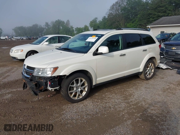 2013 Dodge Journey Crew with VIN 3C4PDCDG0DT591533, listed as a IAAI auction lot 42630548 with 164,961 mi miles and . Bid and sale history available at DreamBid. Image 21.